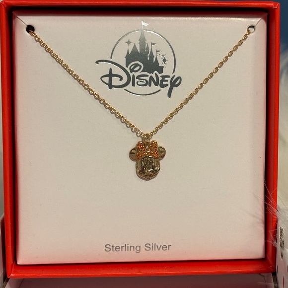 Authentic Disney Minnie Mouse gold tone necklace accented with pink crystal bow. - Picture 2 of 3